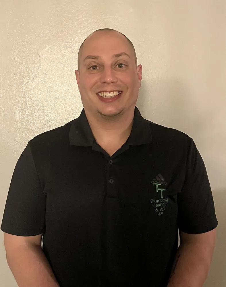 Slide of TT Plumbing Heating and AC