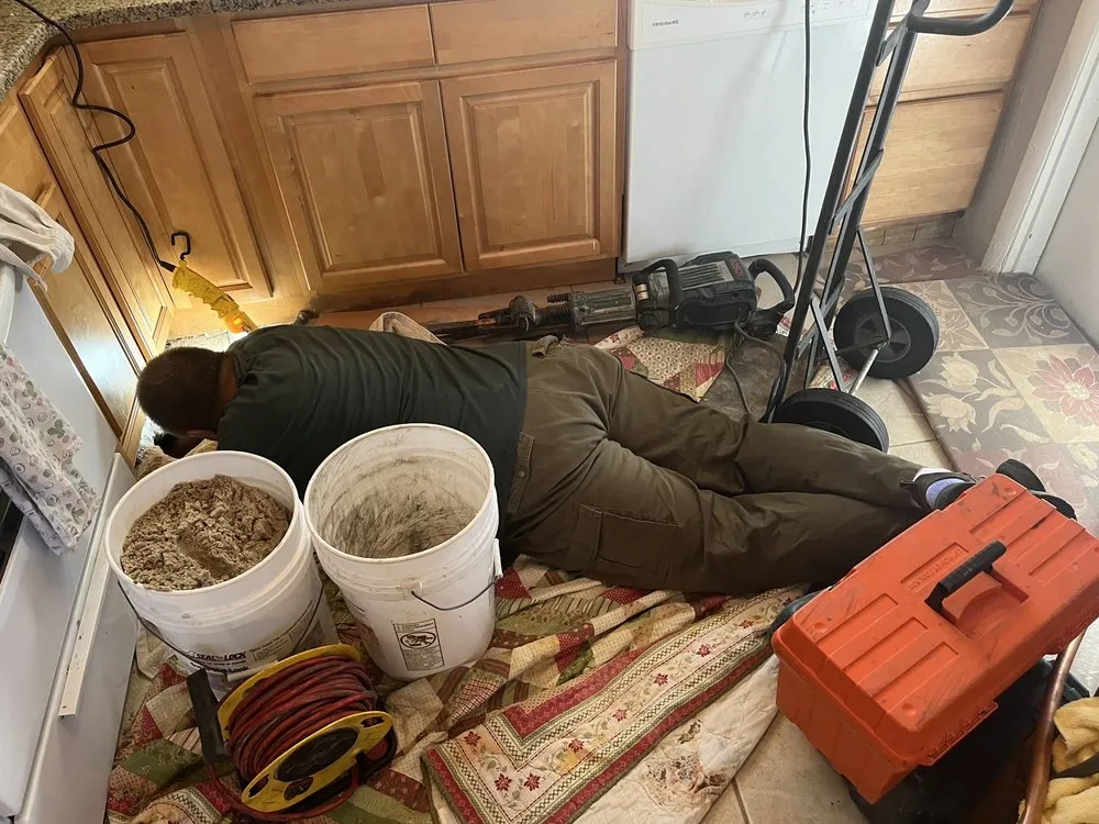 Slide of Tucker's Cut Rate Plumbing