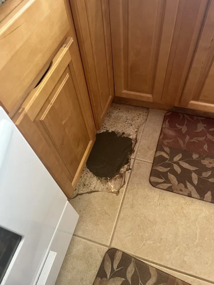 Slide of Tucker's Cut Rate Plumbing