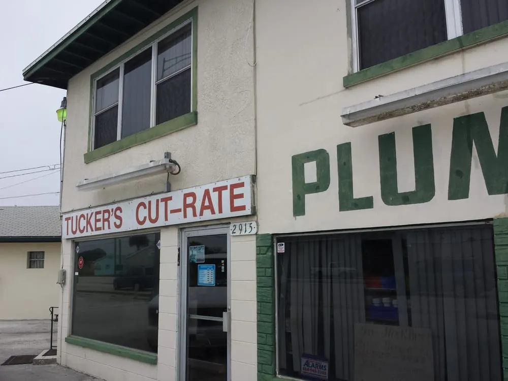 Slide of Tucker's Cut Rate Plumbing