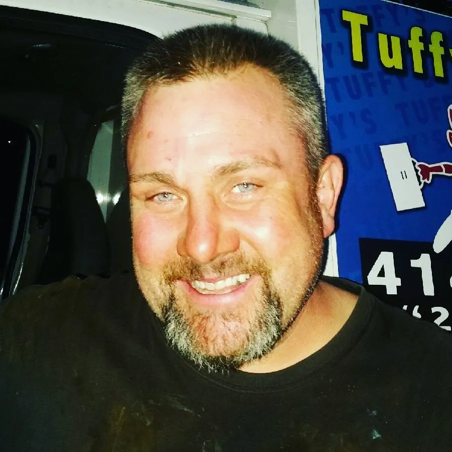 Slide of Tuffy's Sewer & Drain