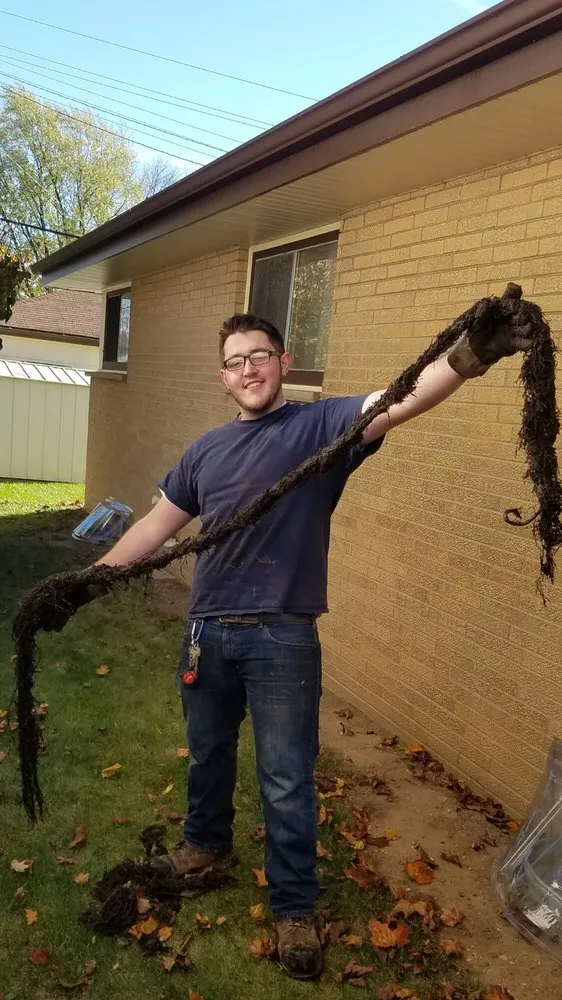 Slide of Tuffy's Sewer & Drain