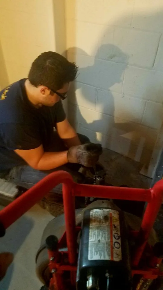 Slide of Tuffy's Sewer & Drain