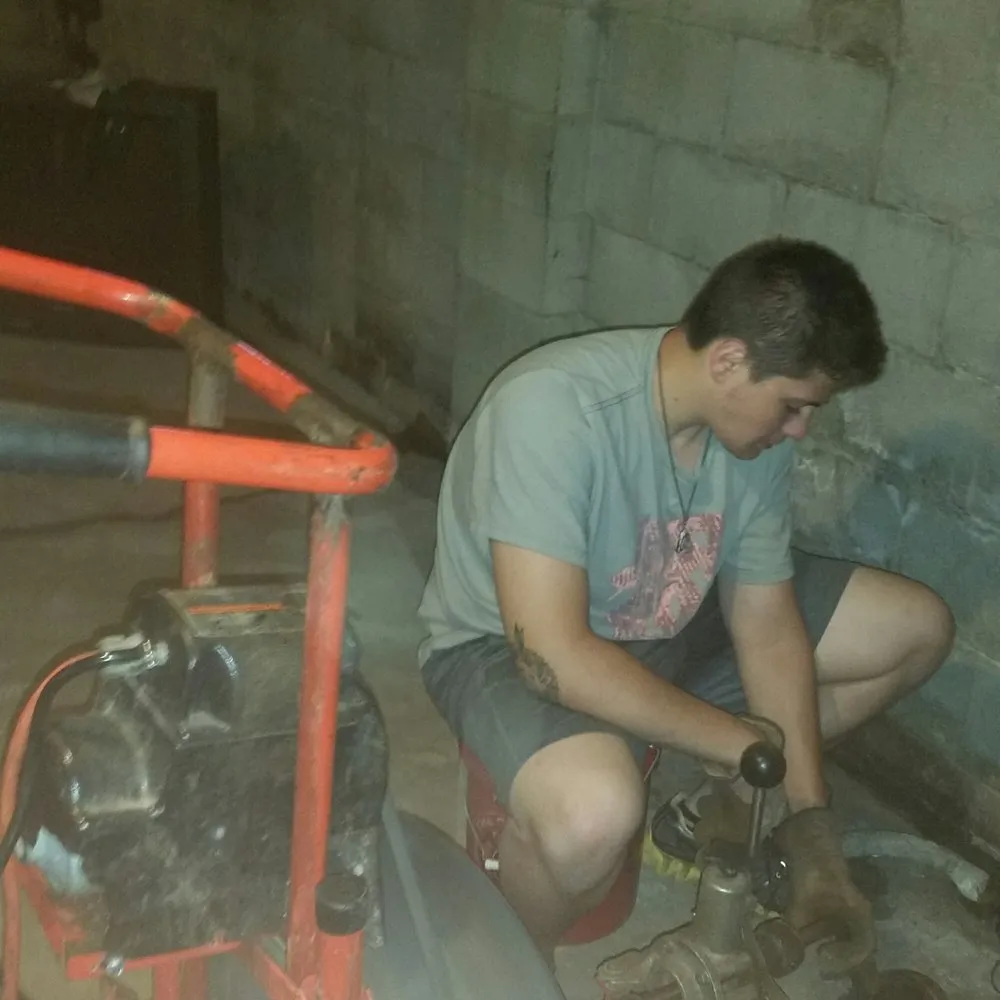 Slide of Tuffy's Sewer & Drain