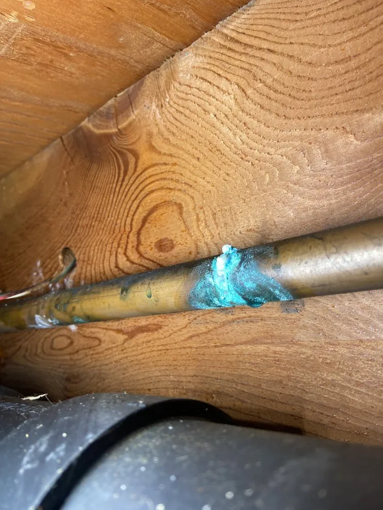 Slide of Two Plumbers