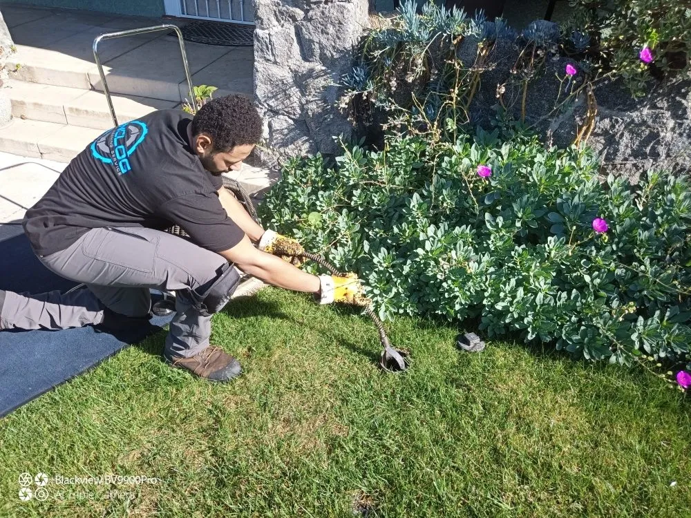 Slide of UNCLOG Drain Cleaning Service