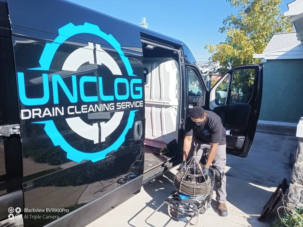 Slide of UNCLOG Drain Cleaning Service