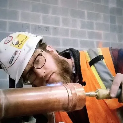 Unmatched Plumbing Company Logo