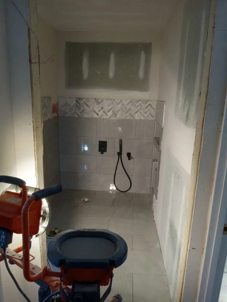 Slide of Up to code plumbing