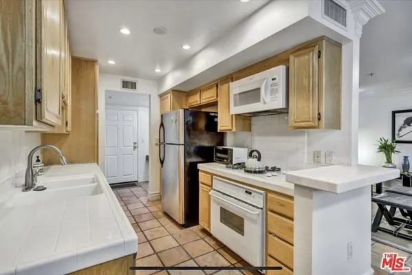 Uptown Water and Mold Logo