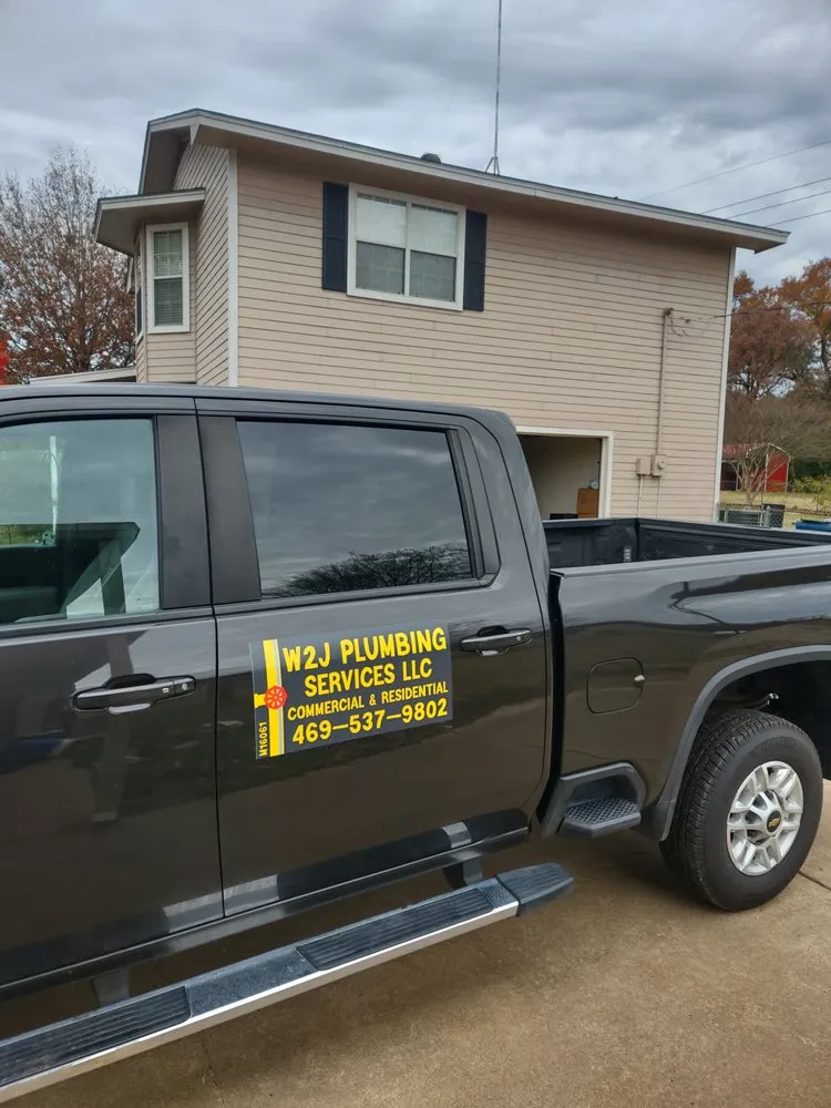 Slide of W2J plumbing services