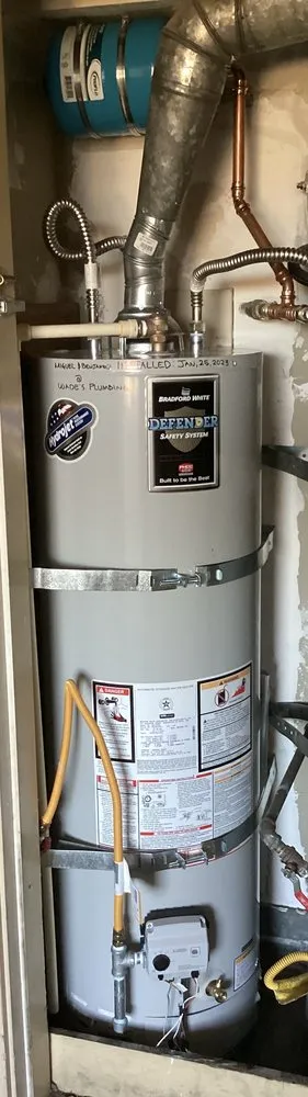 Slide of Wade's Plumbing & Septic