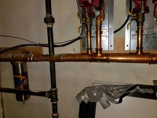 Wahran Piping & Heating Logo