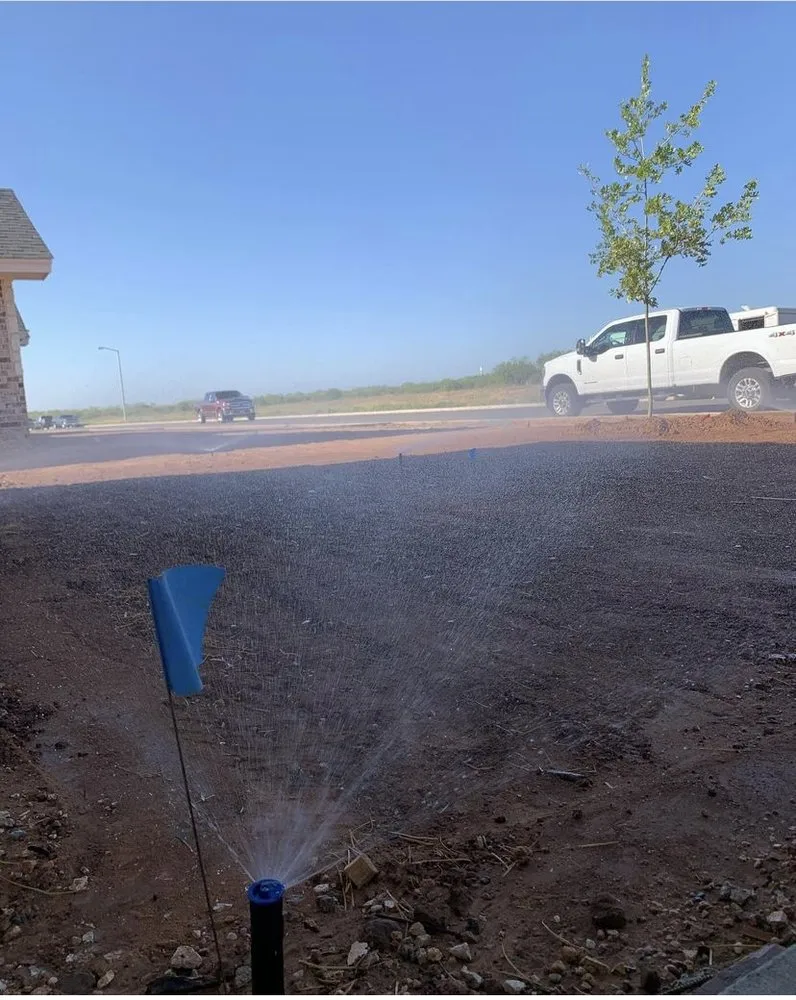 Slide of Walker Lawn & Sprinkler