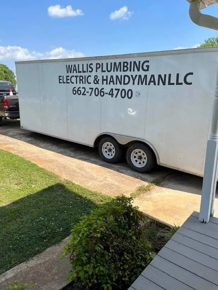 Slide of Wallis Plumbing Electric and Handyman