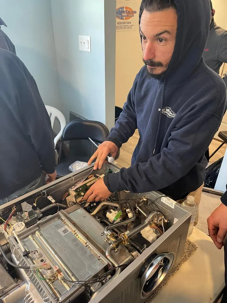 Slide of Walt McCollum Plumbing, Heating, Cooling