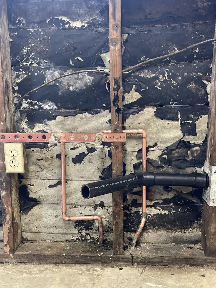 Slide of We Fix Plumbing