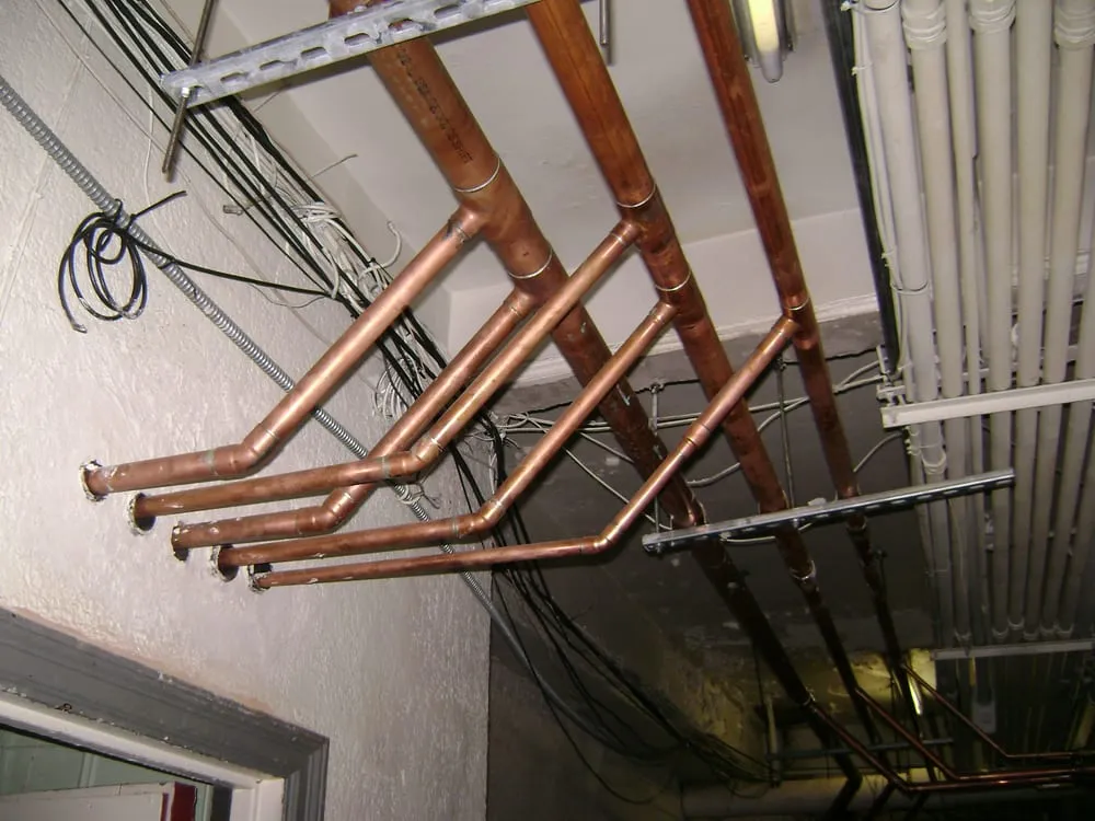 Slide of Well Done Plumbing and Heating