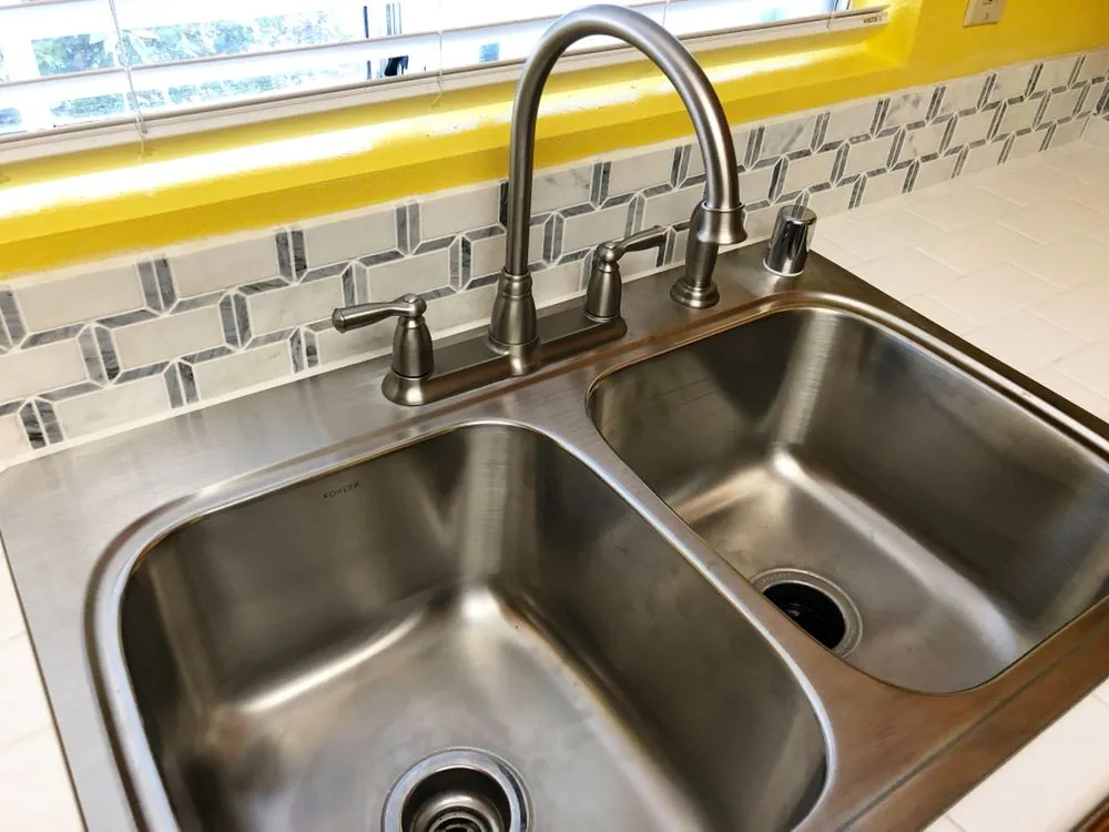 Slide of Well Done Rooter & Plumbing