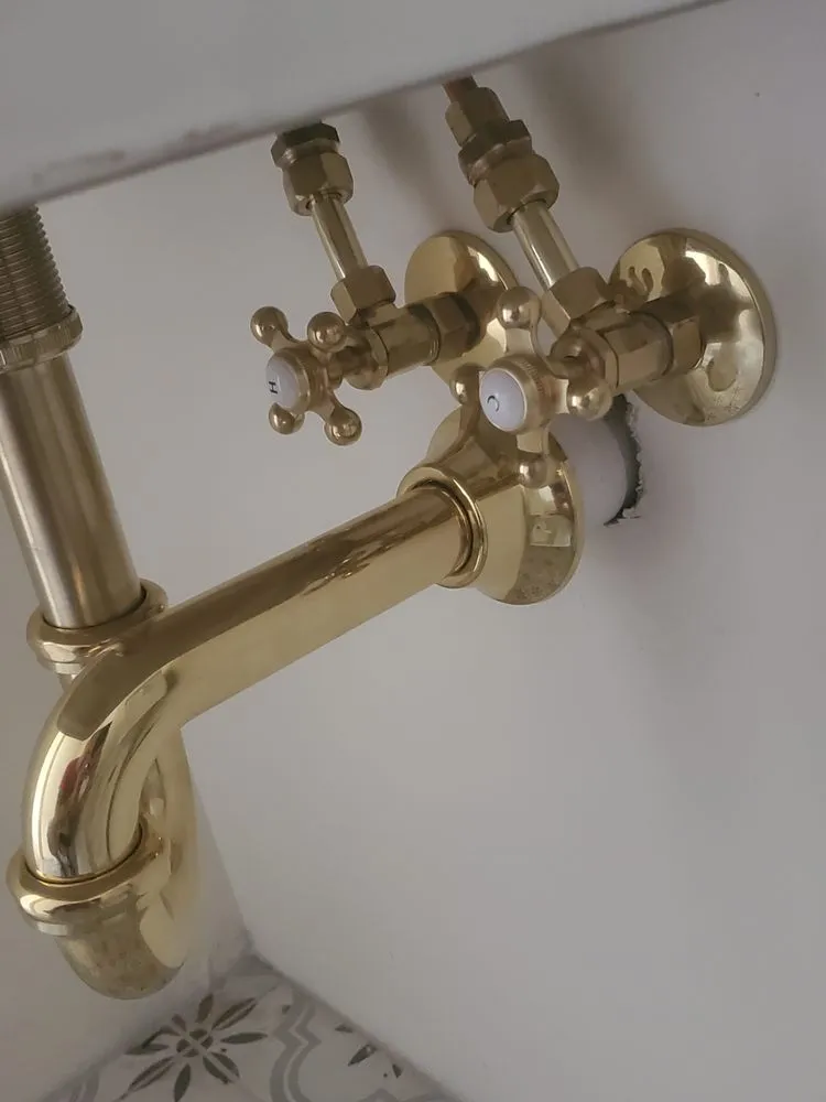 Slide of Well's Plumbing & Heating