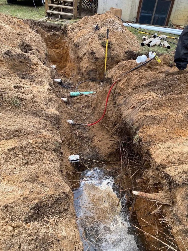 Slide of West Michigan Drain Solutions