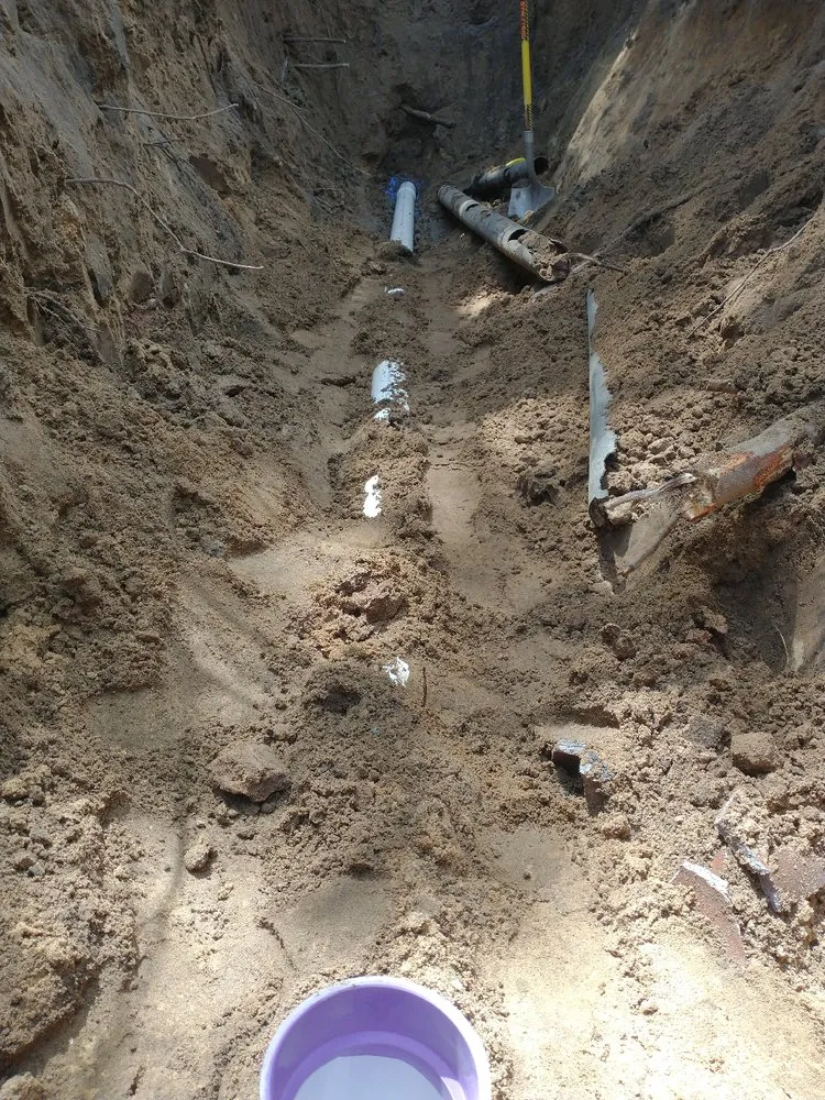 Slide of West Michigan Drain Solutions