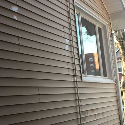 Wheaton plumbing and heating Logo