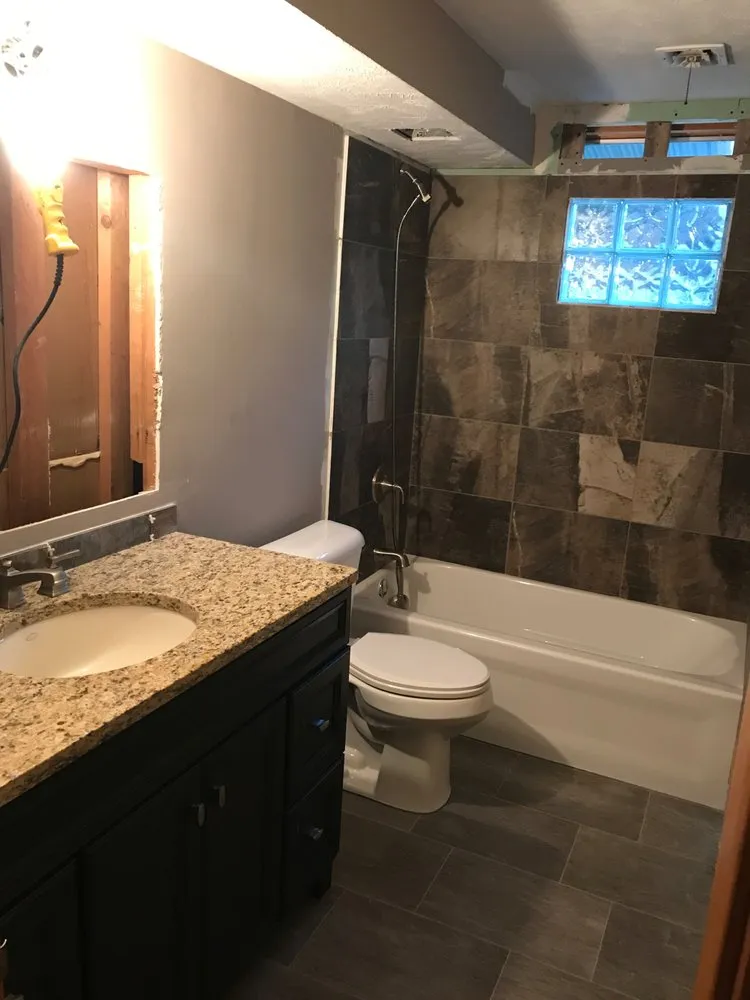 Slide of Whitaker Plumbing/Remodels