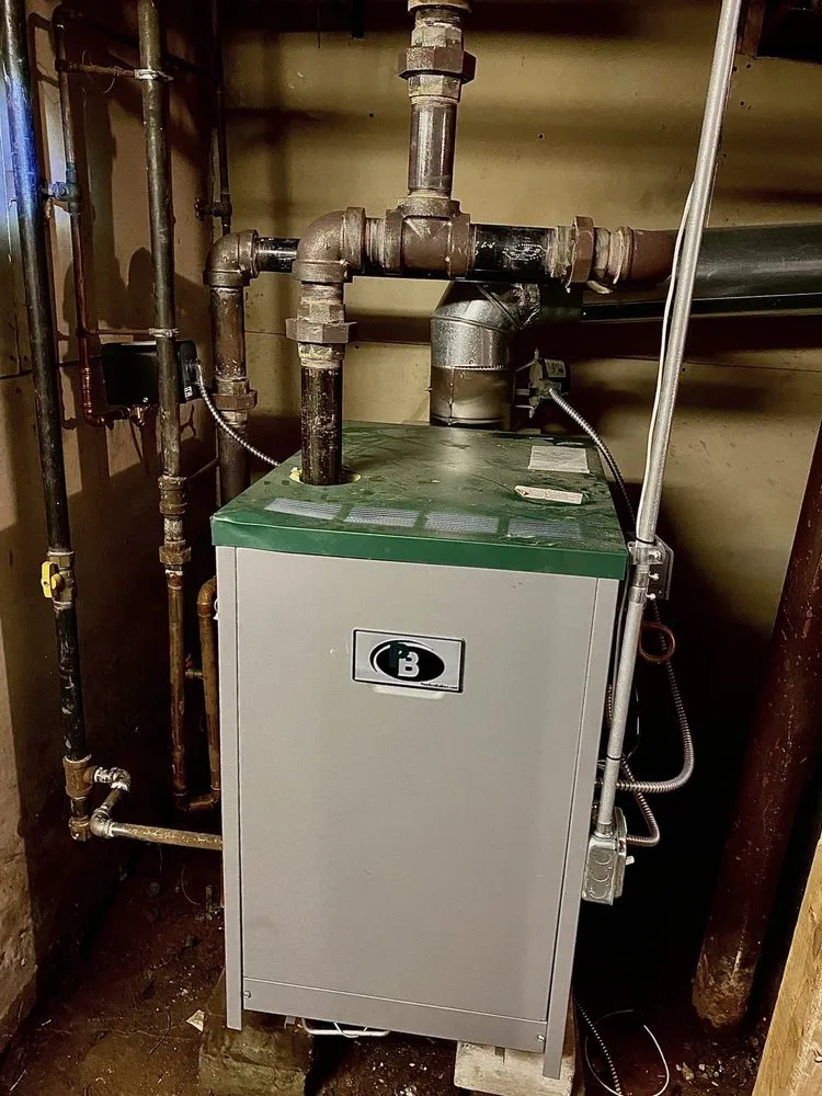 Slide of Williams and Holness Mechanical Plumbing & Heating