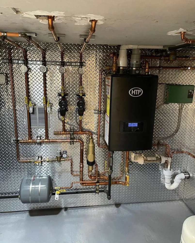 Slide of Wilson's Plumbing Heating HVAC & Electric