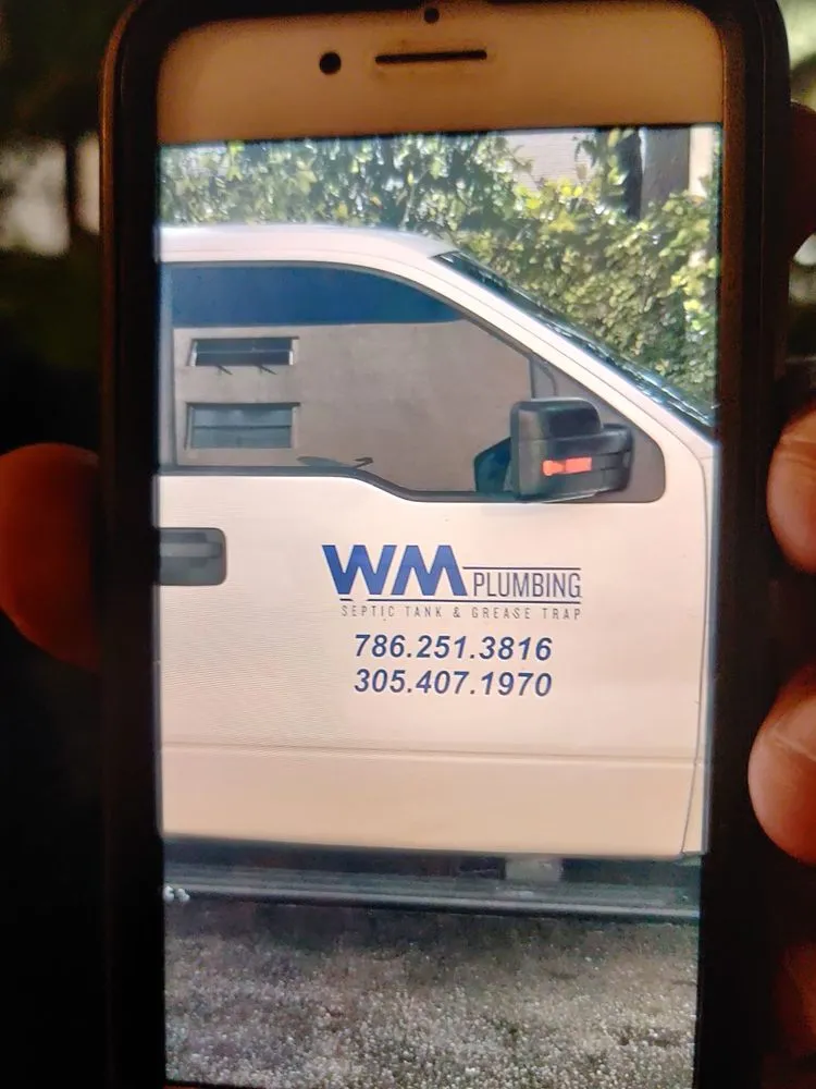 Slide of WM Plumbing Septic Tank & Grease Trap