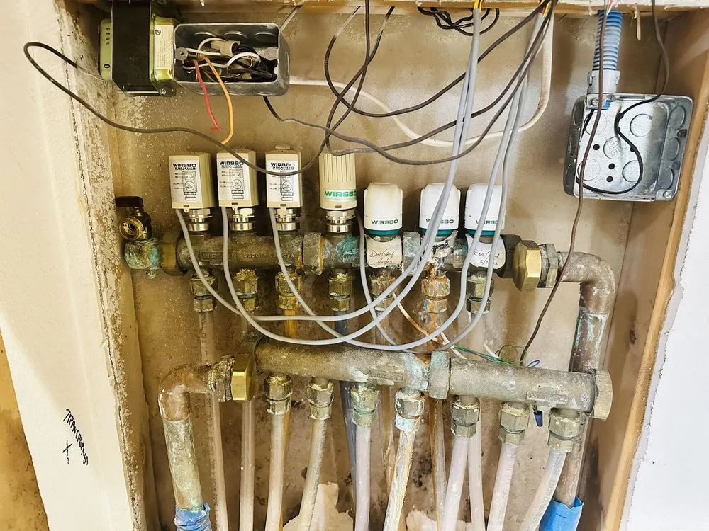 Slide of Wolff Heating Cooling and Plumbing