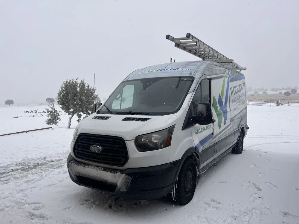 Slide of Wolfgangs Cooling Heating & Plumbing