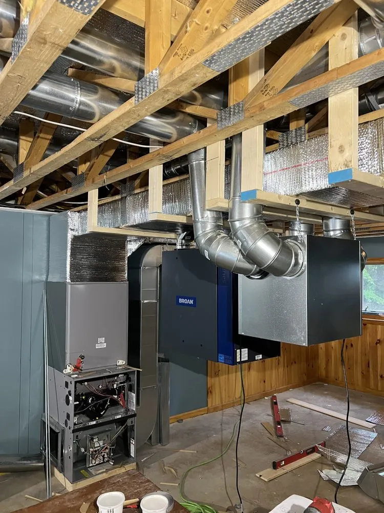 Slide of Wollman Heating and Plumbing