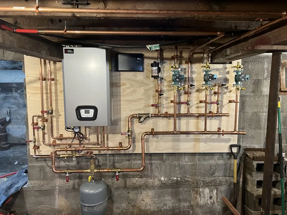 Slide of Wollman Heating and Plumbing