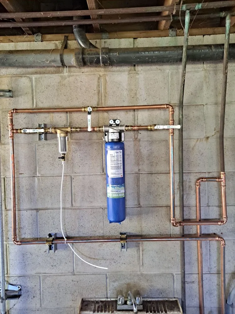 Slide of Woody's Plumbing Services