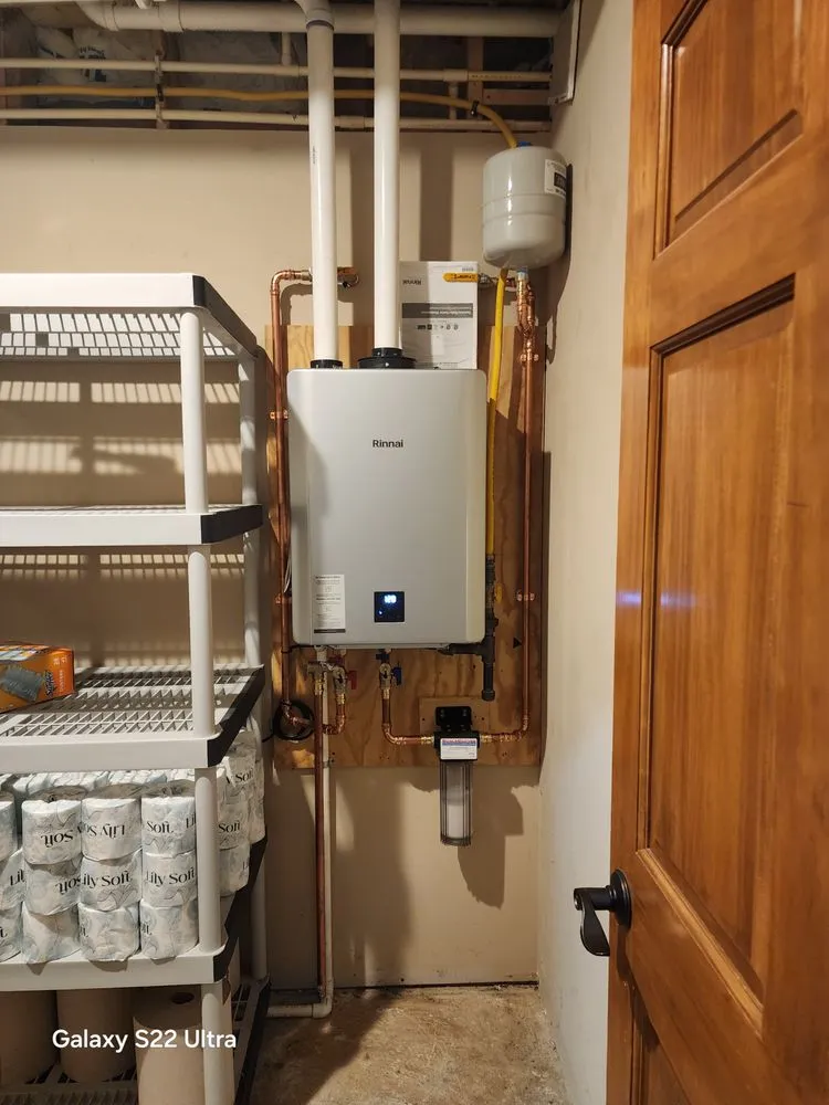 Slide of Woody's Water Heaters And Plumbing Services