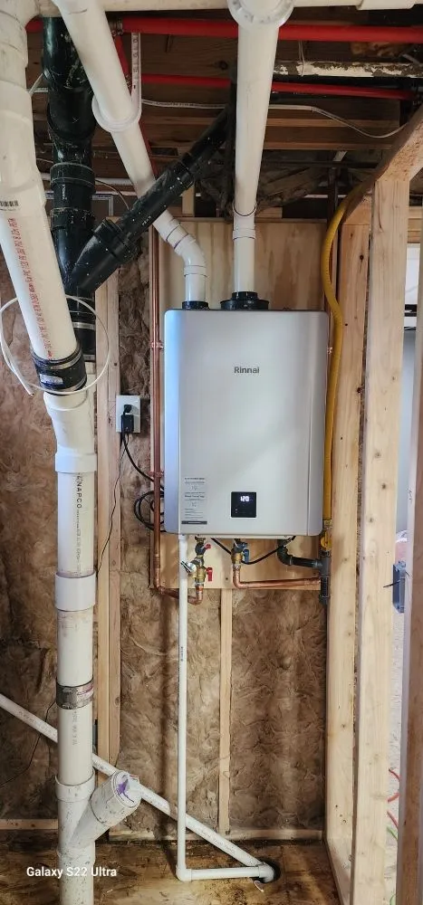 Slide of Woody's Water Heaters And Plumbing Services