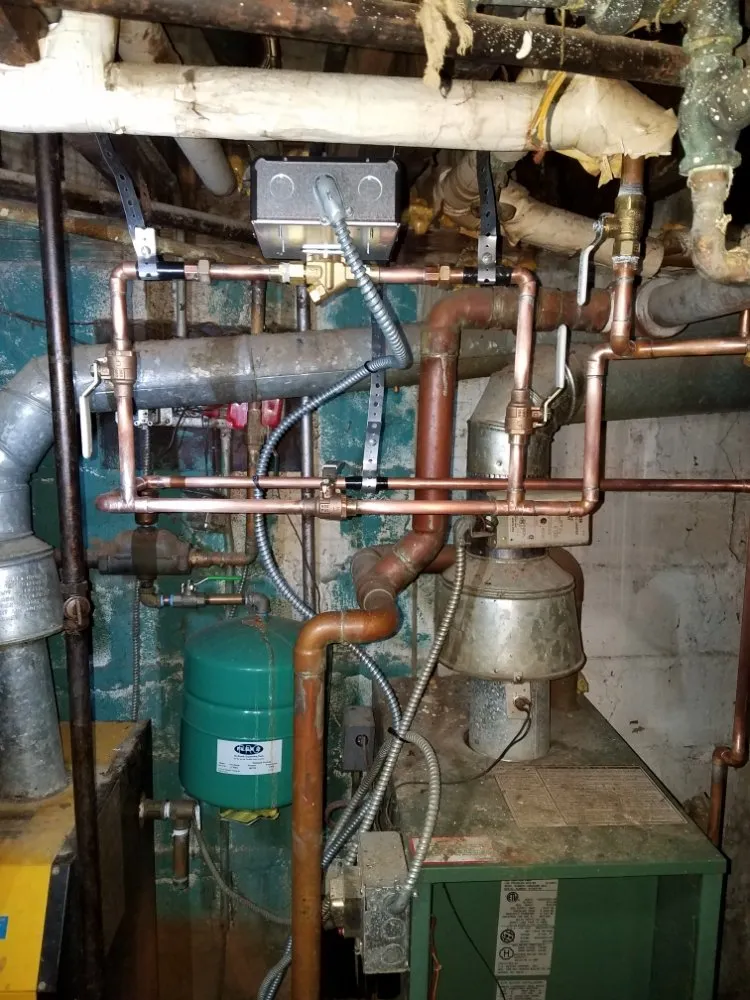 Reliable water heater service in Queens, NY by Woosh Pipe and Drain Company