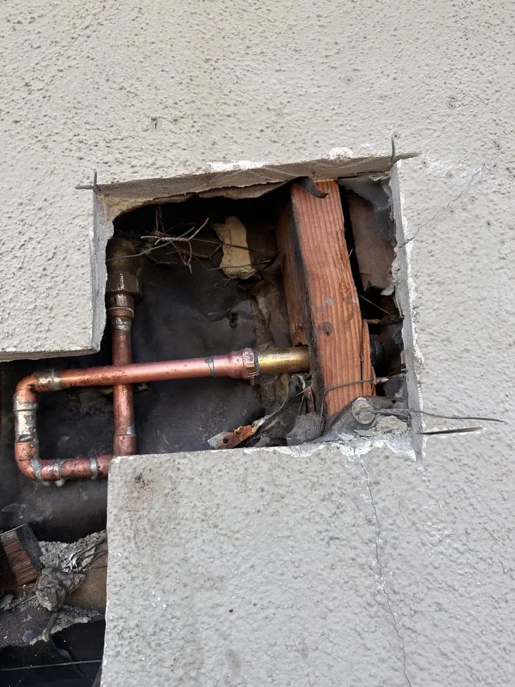 Slide of X V Plumbing