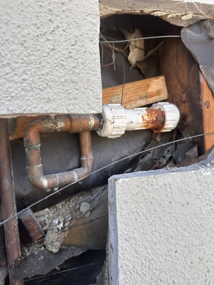 Slide of X V Plumbing