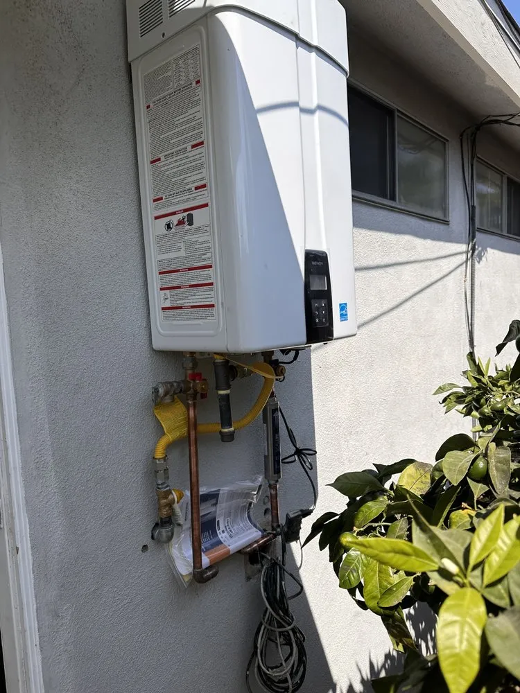 Slide of X V Plumbing