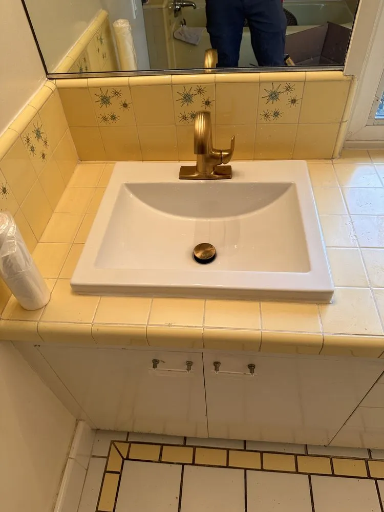 Slide of X V Plumbing