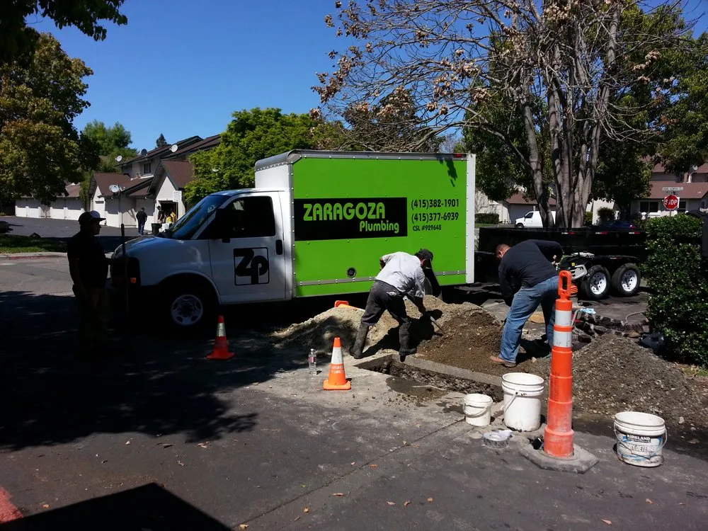 Slide of Zaragoza Plumbing Team